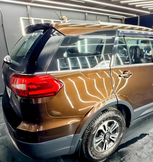 Luxury car paint polishing in Pune.
